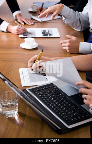 Photo of business people’s hands in a working environment Stock Photo