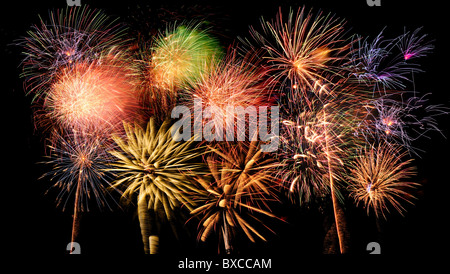 Bright and colorful fireworks against a black night sky Stock Photo