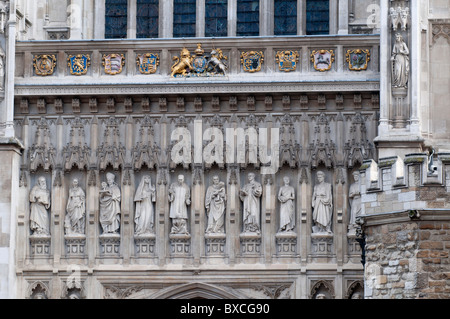 Statues of 10 Christian Martyrs above the Great West Door, Westminster Abbey,  London, England UK Stock Photo