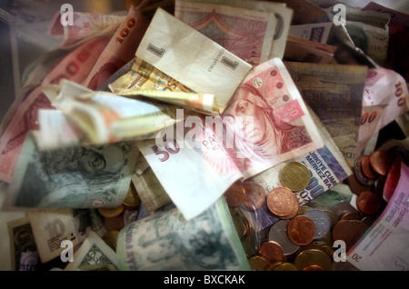 Banknotes and coins Stock Photo