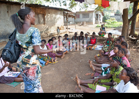 Women attend a community meeting in Freetown, Sierra Leone, West Africa. Stock Photo