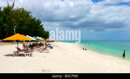 The long white sand beach in Flic en Flac, Black River, Mauritius Stock Photo