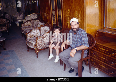 Tripoli Lebanon Souk Al - Haraj Muslim Father & Son in Furniture Shop Stock Photo