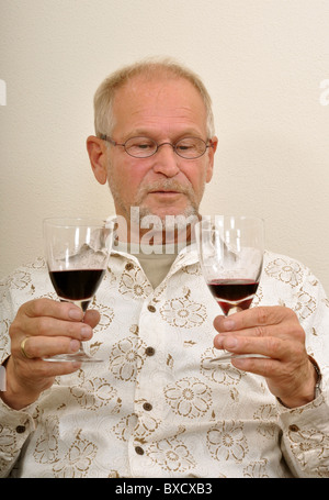 Senior man having a good time with friends Stock Photo