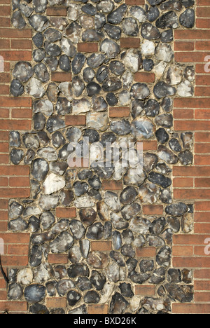 Detail of a pebble-stone cladded wall on a traditional Norfolk cottage Stock Photo