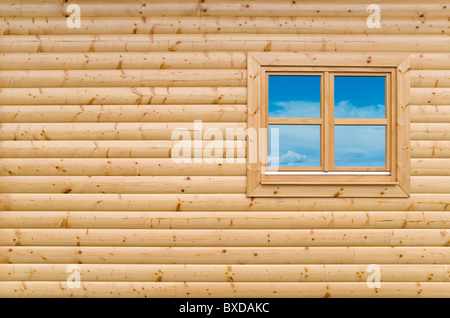 New Wooden cottage exterior facade wall background with closed window Stock Photo
