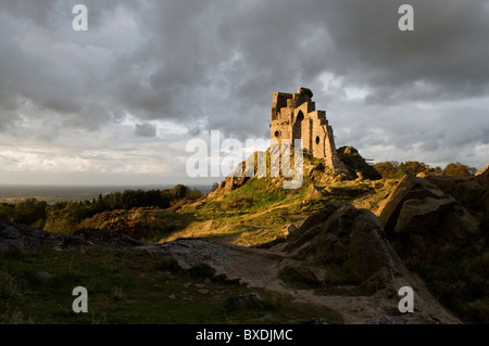 The folly of Mow Cop on the Staffordshire, Cheshire border under a brooding September sky Stock Photo