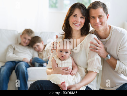 Family in their living room Stock Photo