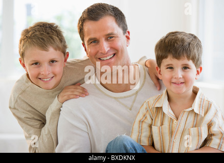 Father and his two sons Stock Photo