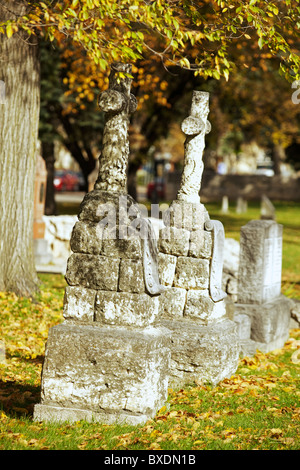 Old historical cemetery at Saint Boniface Cathedral aka Cathedral Basilica of Saint-Boniface, Winnipeg, Manitoba, Canada Stock Photo