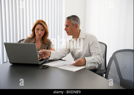 Business people in conference room Stock Photo