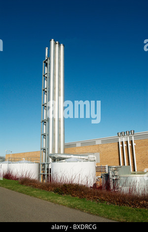 Storage tanks and ventilation pipes at Norfolk and Norwich University Hospital Norwich UK Stock Photo