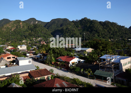 View over outskirts of small town of Rurrenabaque near Madidi National Park, hills and tropical forest in background, Beni department,  Bolivia Stock Photo