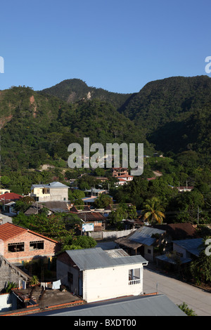 View over outskirts of small town of Rurrenabaque near Madidi National Park, hills and tropical forest in background, Beni department,  Bolivia Stock Photo