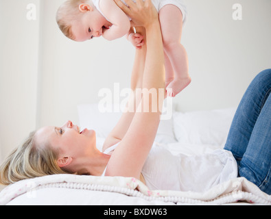 Mother playing with her baby Stock Photo