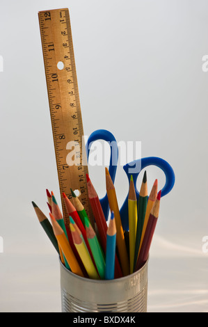 Colored pencils ruler and scissors in can Stock Photo