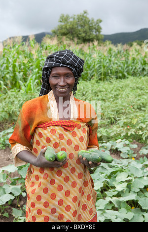 Mrs. Khabitu Ally Mkude is a vegetable farmer in Iringa, Tanzania, East Africa. Stock Photo