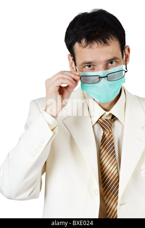 Doctor of Medical Sciences is looking over his glasses on white Stock Photo