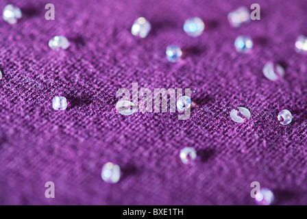 Macro background of textile with beads and sequins. Shallow depth of field Stock Photo