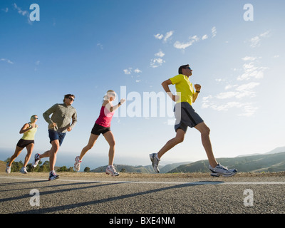 Runners on a road in Malibu Stock Photo