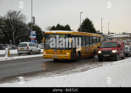 school bus on a snowy trip Stock Photo