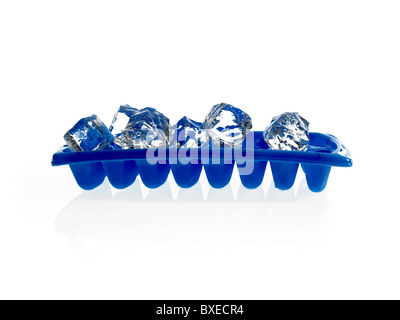 A blue plastic ice cube tray with frost on it isolated over a white  background, Stock image