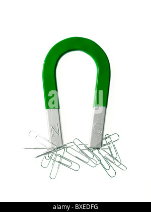 Magnet and paper clips Stock Photo