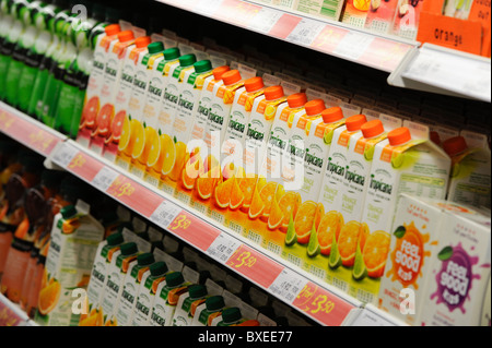 Tropicana drink cartons stacked on UK supermarket shelves. Stock Photo