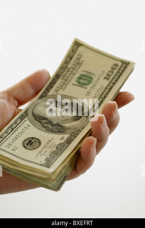 Hand holding money Stock Photo