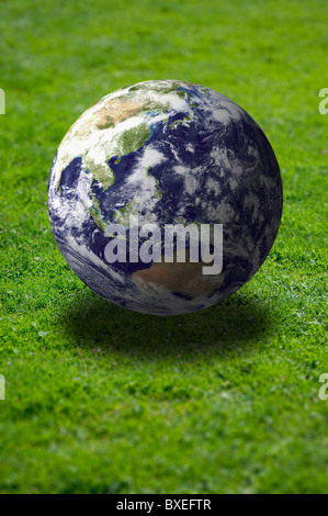 Globe on lawn Stock Photo