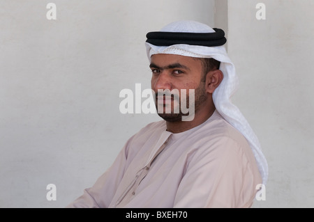 A Man with the typical Arabic dress in Dubai Stock Photo