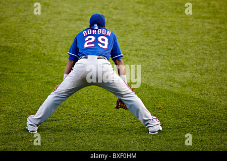 Texas Rangers' Jerry Harrison, wearing jersey number 42 to honor Jackie  Robinson, warms up before batting against the Seattle Mariners at Safeco  Field in Seattle on April 15, 2007. Robinson, who wore