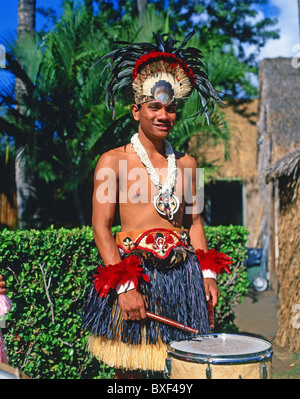 Hawaiian dancer playing drums, Kodak Hula Show, Honolulu, Oahu, Hawaii, United States of America Stock Photo