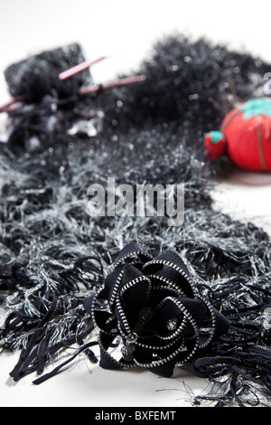Still Life of Vintage Zipper Pin, Knitting, Yarn and Needles Stock Photo
