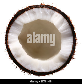 Half of the coconut is isolated on a white background. File contains a clipping paths. Stock Photo