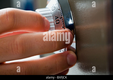 Close-up of fingers searching correct combination of code Stock Photo