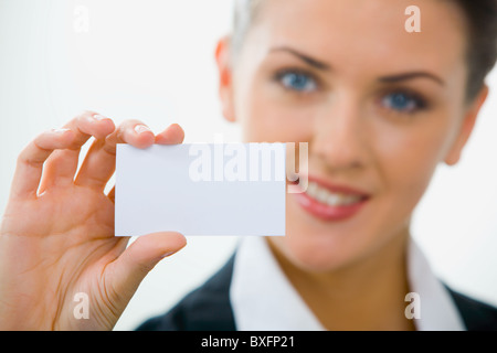 Image of woman holding her visiting card Stock Photo