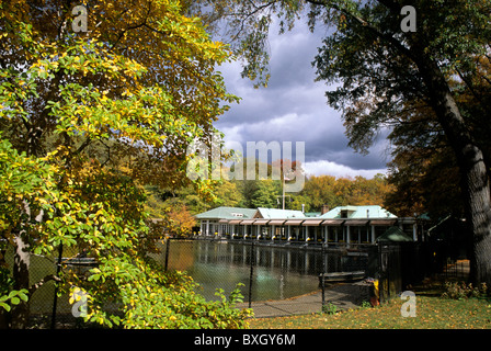 Central Park New York Loeb Boathouse restaurant building and The Lake in the autumn. Central Park Conservancy New York City USA Stock Photo