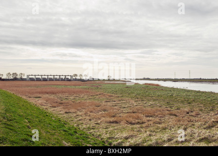 Tail Sluice gate on the River Great Ouse, a flood defence system for the surrounding countryside and Kings Lynn Power Station. Stock Photo
