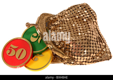 game, game of chance, money bag with plastic coins, 1950s, 50s, 20th century, historic, historical, symbol image, Euro, coin, capital, small change, loose change, chump change, budget, money supply, quantity of money, volume of money, monetary growth rate, currency, currencies, consumption, personal consumption, private consumption, per capita consumption, increase of consumption, save, saving, clipping, cut out, sequin, sequins, sequined, household, chips, crisps, portemonnaie, money purse, wallet, coin purse, cut-out, cut-outs, Additional-Rights-Clearences-Not Available Stock Photo