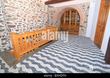 Typical internal cobblestone decorations inside monastery Stock Photo