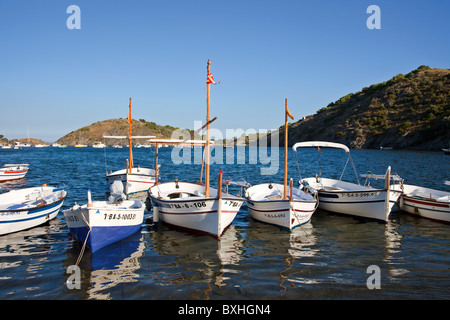 Boats moored in Port Lligat Parc Natural de Cap de Creus Emporda Catalunya Spain Stock Photo