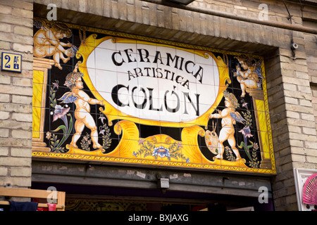 Terracotta / terra cotta tile / tiles forming sign on the front of a shop selling Spanish ceramics to tourists in Seville. Spain Stock Photo