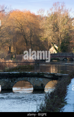 Bridges over River Coln in the Cotswold village of Bibury Gloucestershire England UK