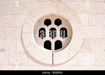 window in white and pink stone circular glass works and shall specify Stock Photo