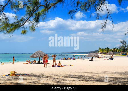 The long white sand beach in Flic en Flac, Black River, Mauritius. Stock Photo