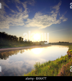 a beautiful, moving morning mist over the river Stock Photo - Alamy