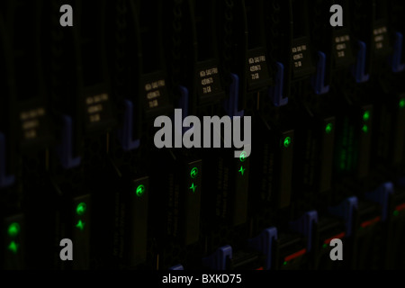 Hard drives in a data center in a row Stock Photo