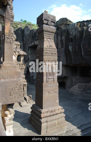 Cave No 16 : Dhvaja stamba , Victory pillar at the southwest of Kailasa, Ellora Caves, Aurangabad, Maharashtra, India. Stock Photo