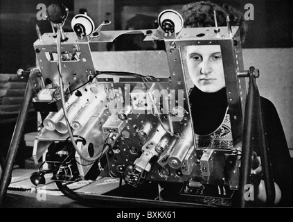 television / broadcast, TV set, production of tv sets, Graetz company, female worker assembling chassis at assembly line, Altenahr, Germany, 1954, Additional-Rights-Clearences-Not Available Stock Photo